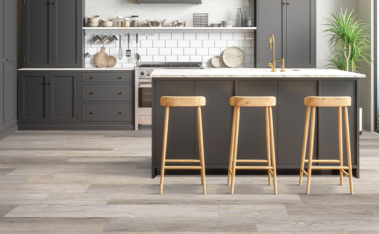 kitchen with vinyl floors and a white backsplash